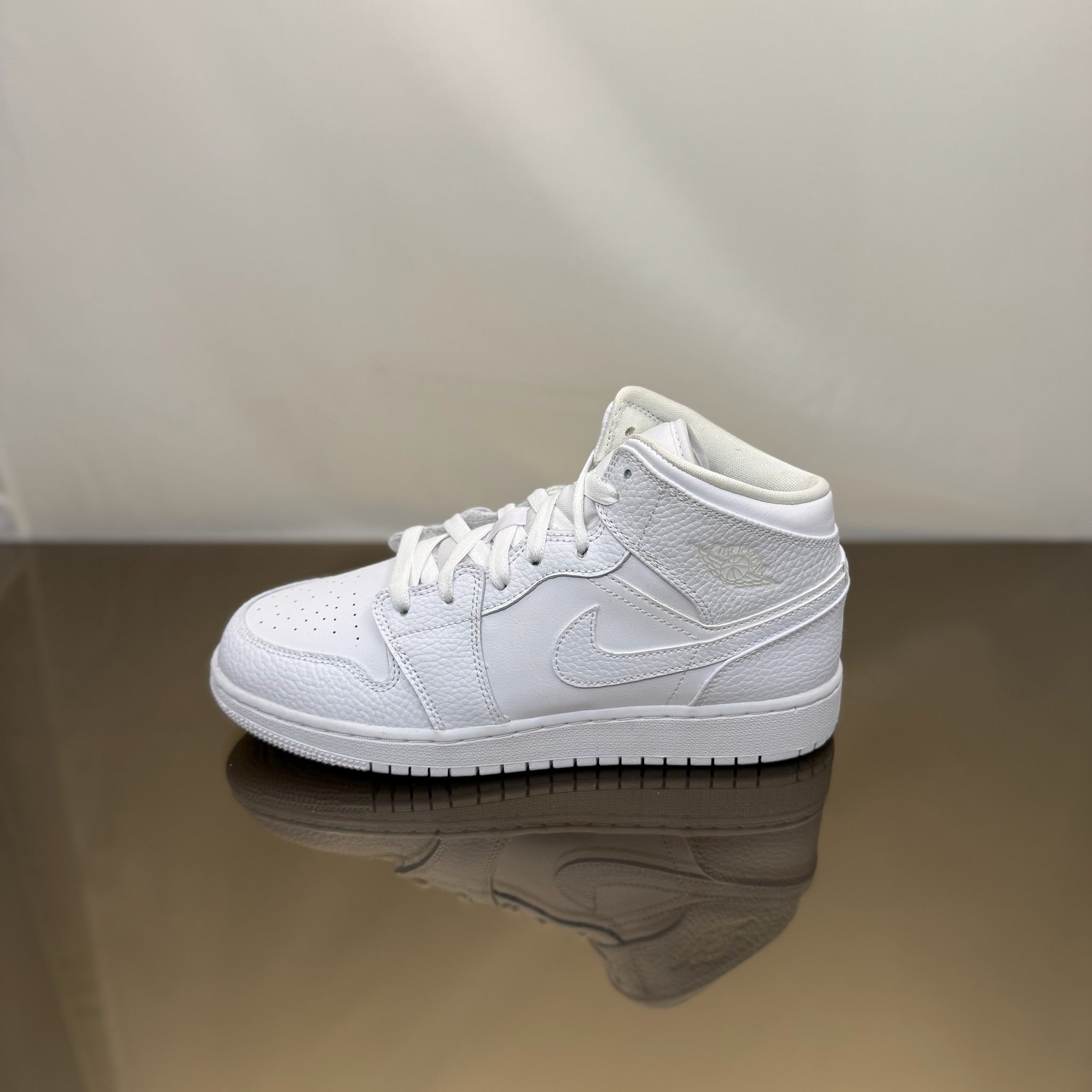 Jordan 1 Mid Triple White