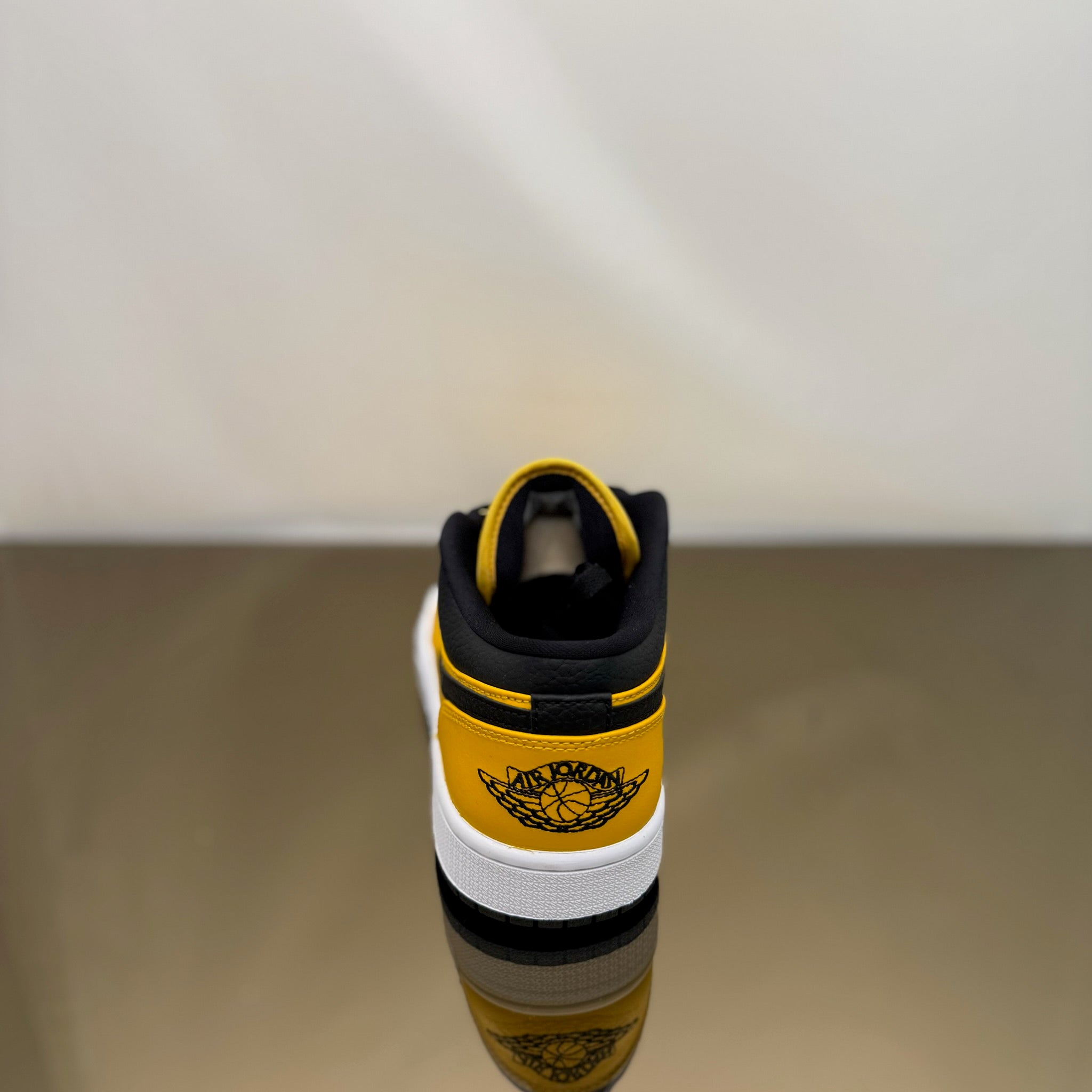 Jordan 1 Low University Gold