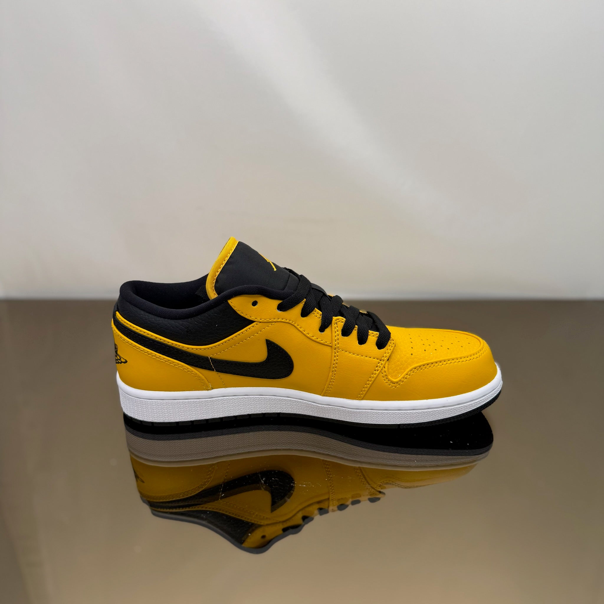 Jordan 1 Low University Gold