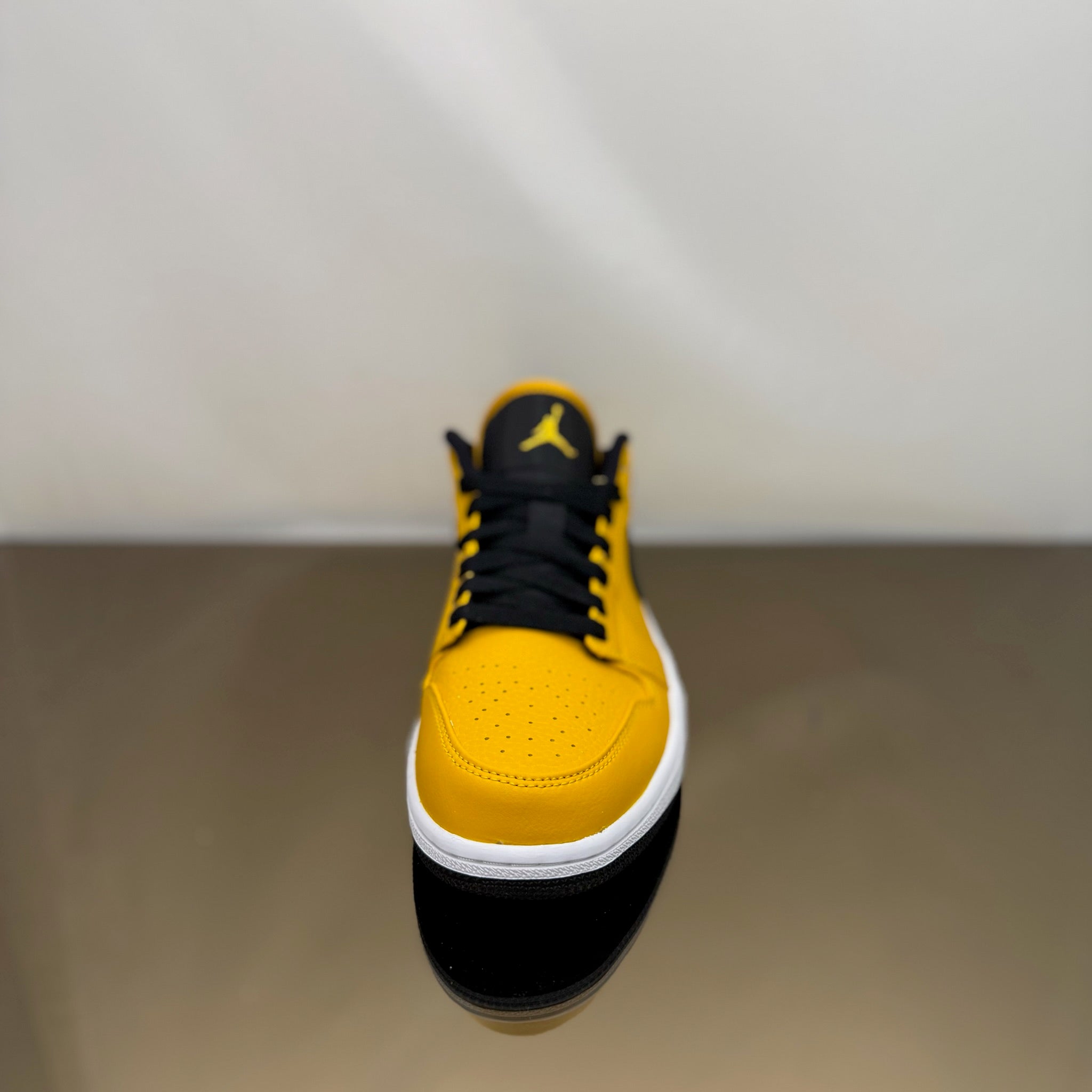 Jordan 1 Low University Gold