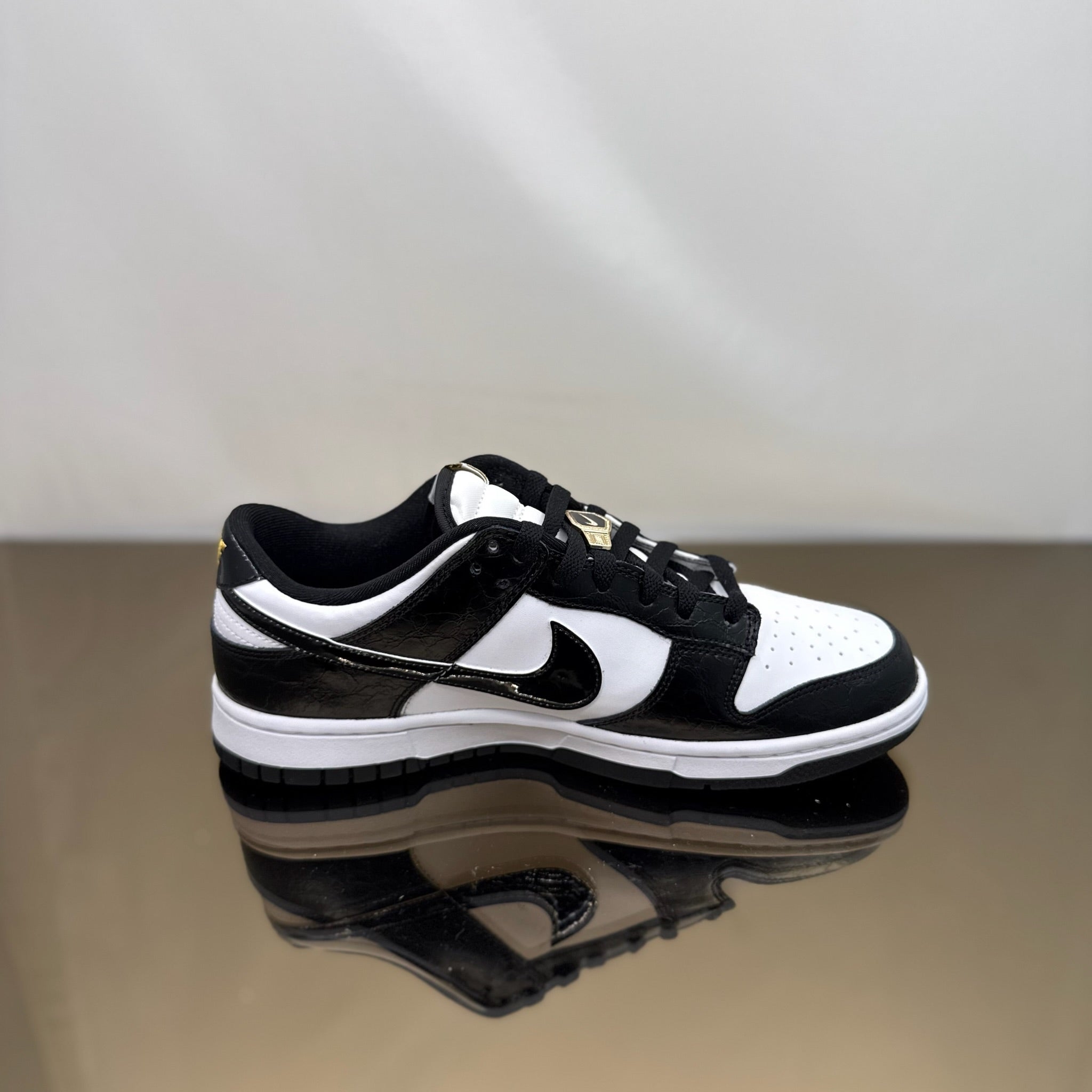 Nike Dunk Low World Champs Black White