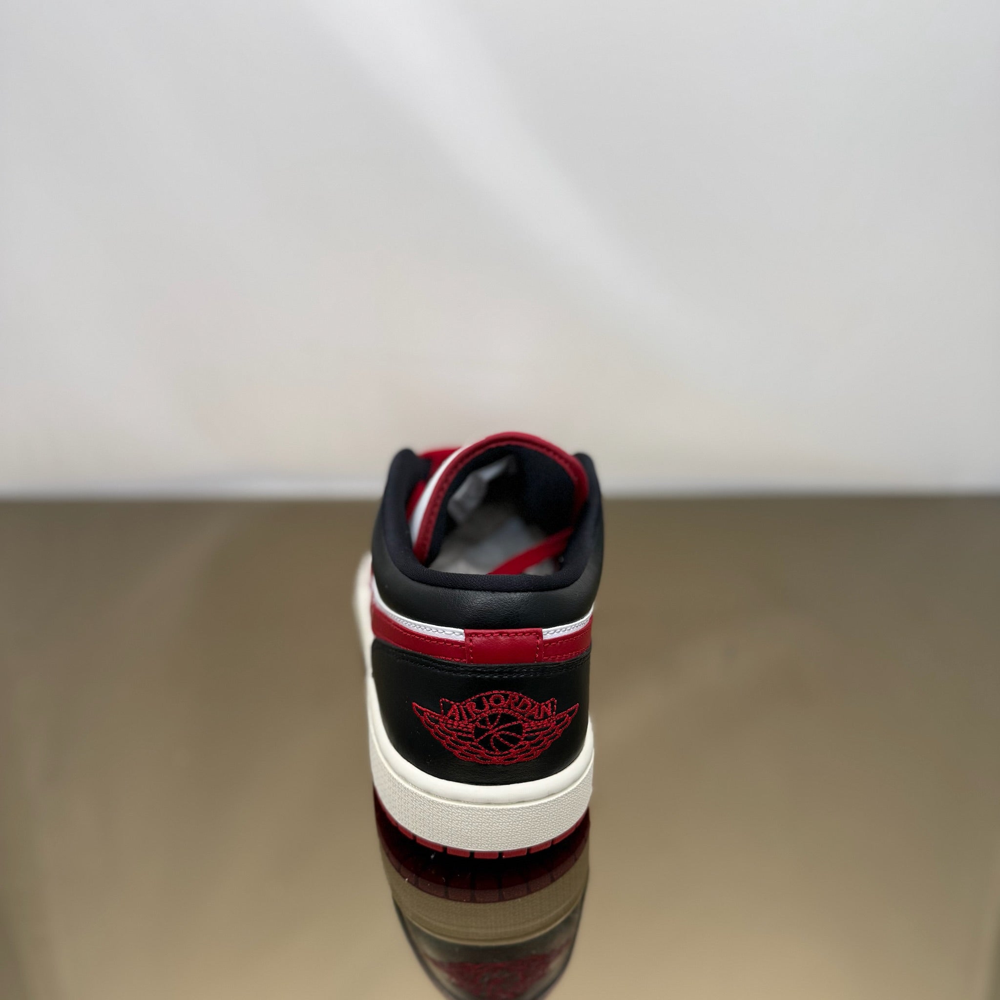 Jordan 1 Low Reverse Black Toe (W)