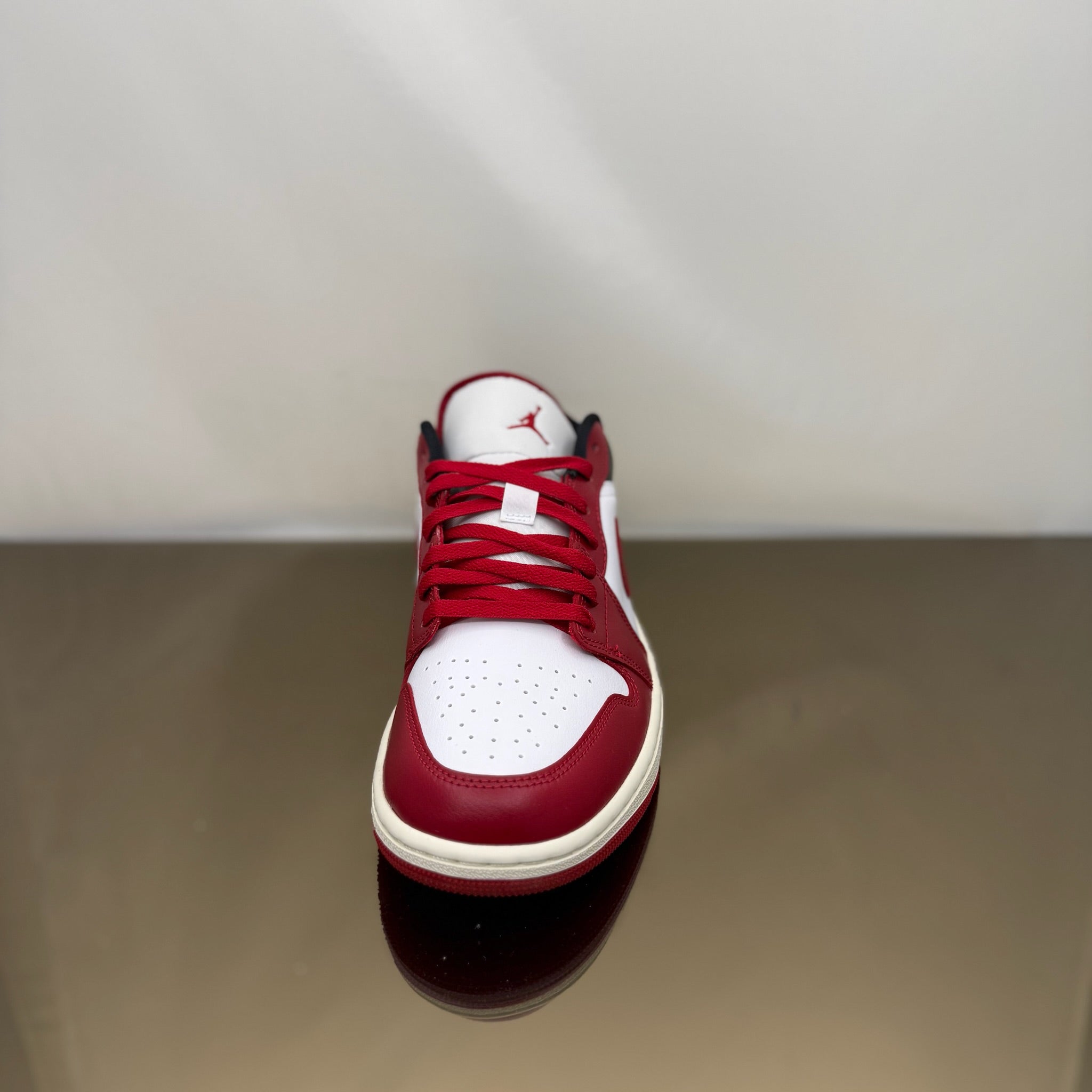 Jordan 1 Low Reverse Black Toe (W)