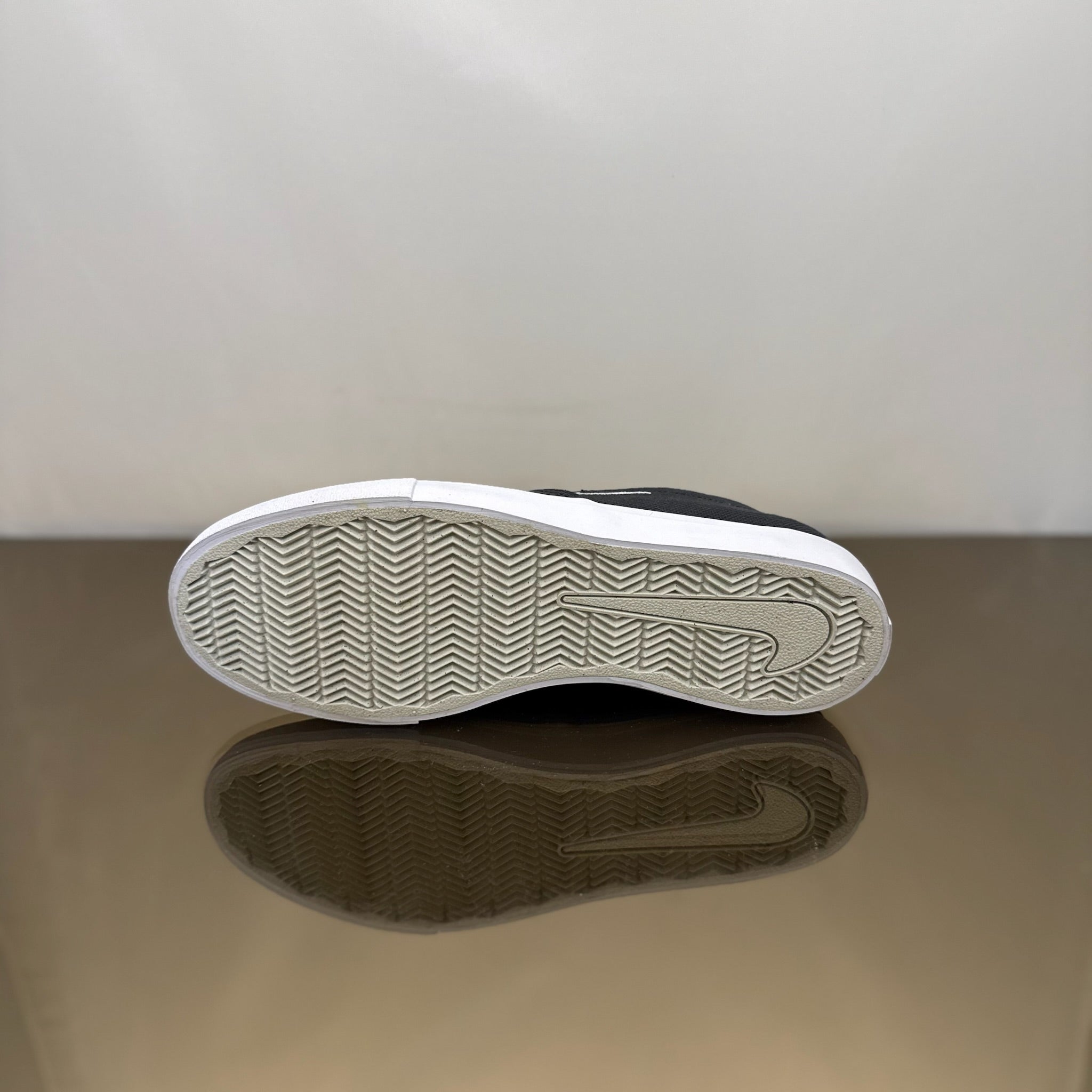 Nike SB Portmore II Solarsoft Slip Schwarz Light Bone
